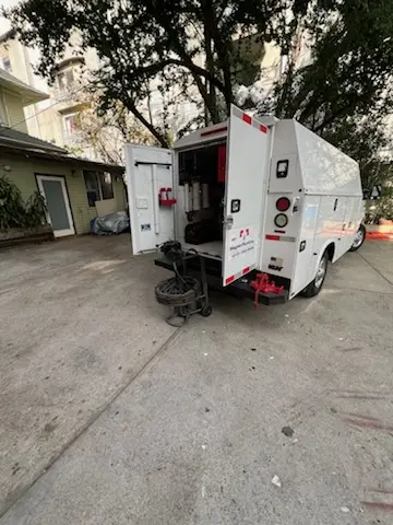 Magnet Plumbing service vehicle on-site for Water Heater Repair in Holiday Villa